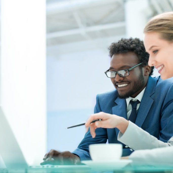 Business people with laptop in office